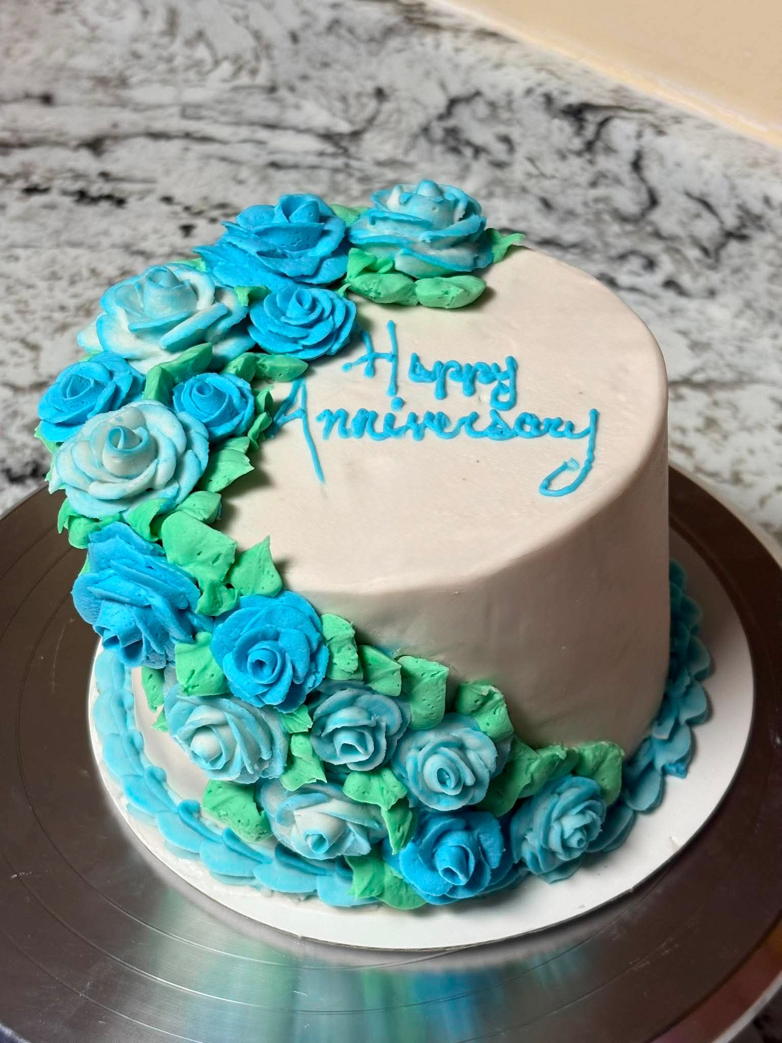 Blue and white floral anniversary cake